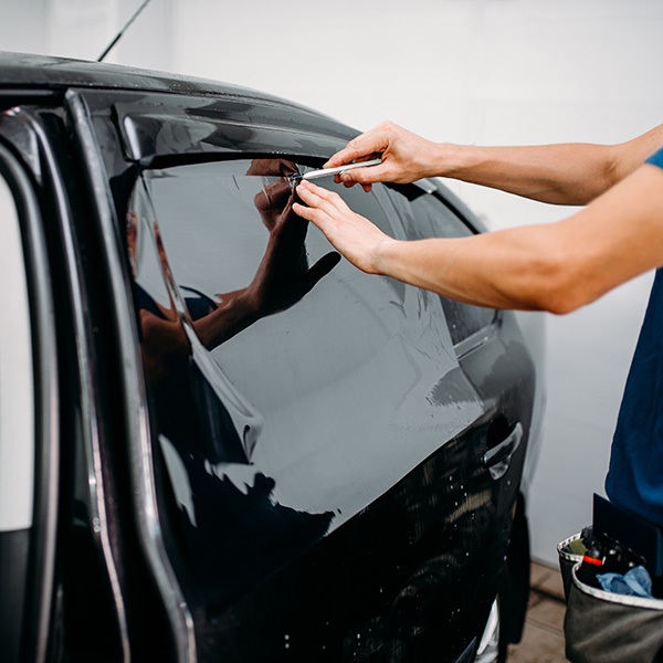 Male auto wrapper with blade, car tinting film