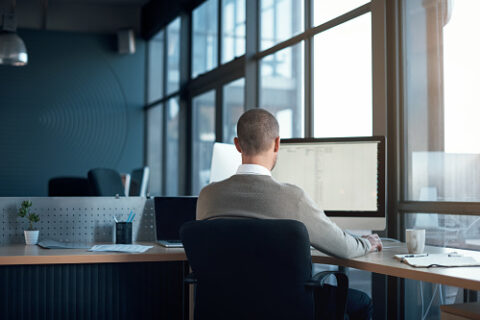 Cropped shot of a businessman working at his desk